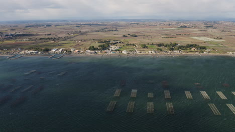 Right-to-left-aerial-traveling-over-the-Bassin-de-Thau-oyster-farms